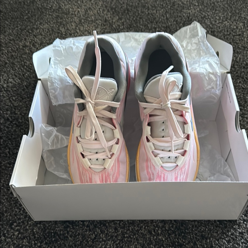 Pearl Pink/multi colour Nike Air Zoom G.T. Cut 2 basketball shoes.